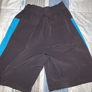 Blue and grey swimming trunks